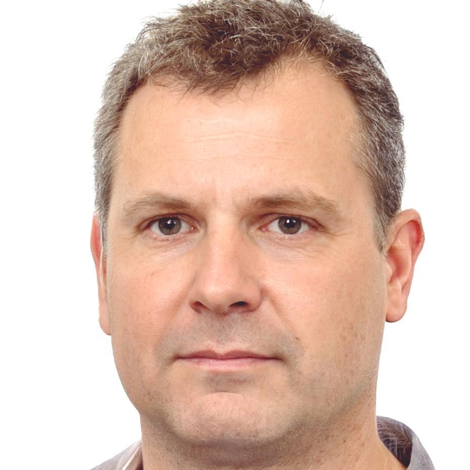 Mitarbeiter bei der Teamarbeit in unserem Münchner Büro
